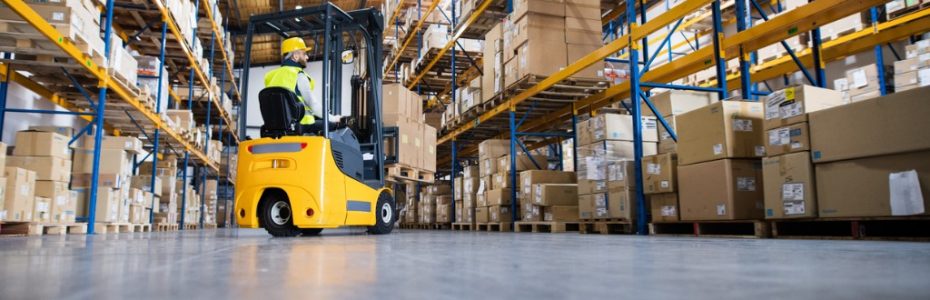 warehouse-man-worker-with-forklift-picture-id897280394